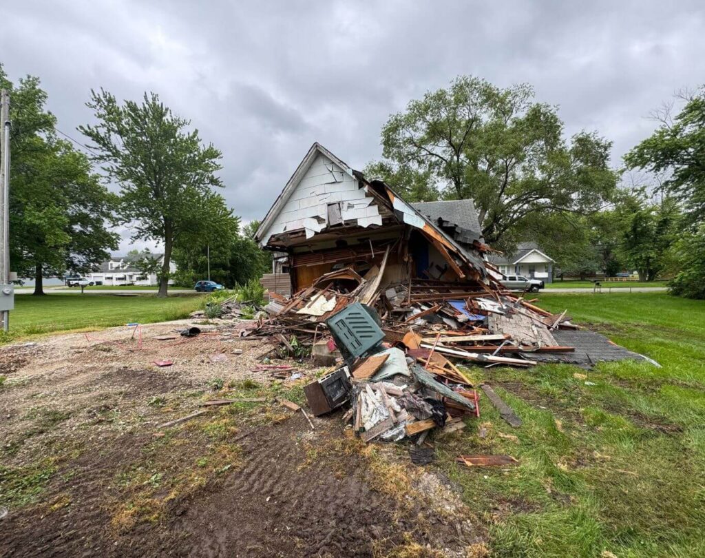 A broken house that needs construction dumpster rentals in Ashland, MO for dumping waste