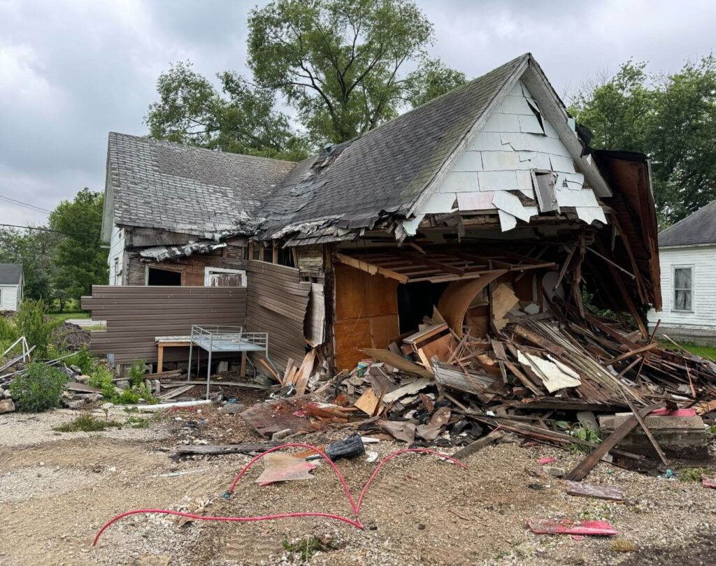 A broken house that needs construction dumpster rentals in Columbia, MO for dumping waste